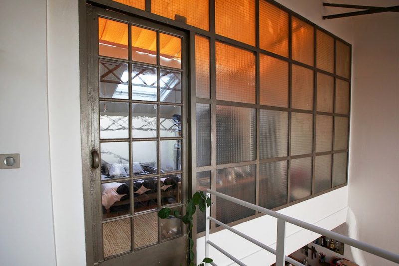 Mur verrière atelier dans un loft